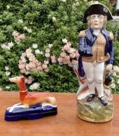 An antique porcelain Toby mug