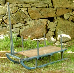 An antique pull sled/pung in