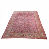 AN ANTIQUE SAROUK CARPET An an