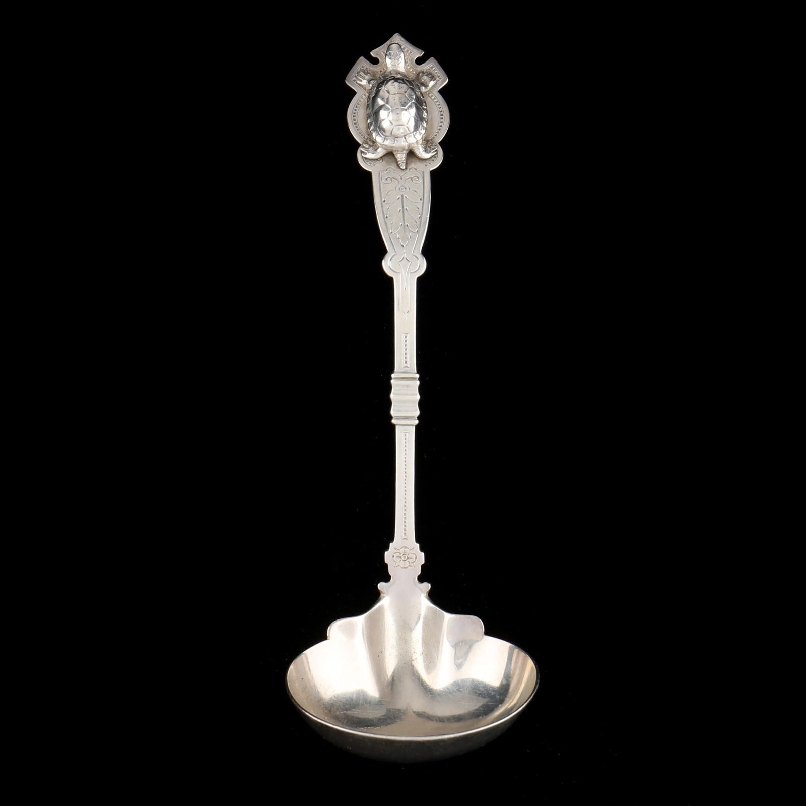 AN ANTIQUE STERLING SILVER LADLE