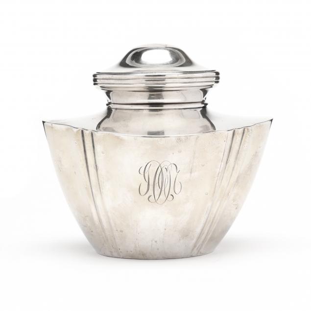 AN ANTIQUE STERLING SILVER TEA