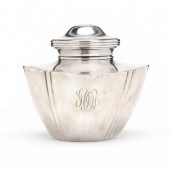 AN ANTIQUE STERLING SILVER TEA
