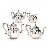 AN ANTIQUE STERLING SILVER TEA