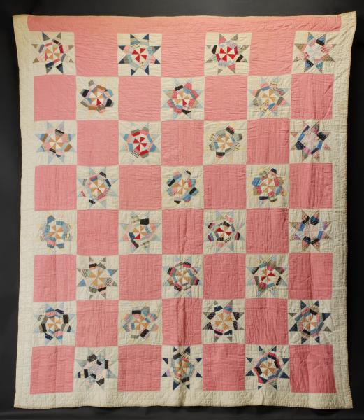 AN ANTIQUE 'STRING STAR' PATTERN