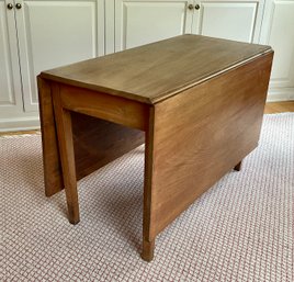 An antique table, the top