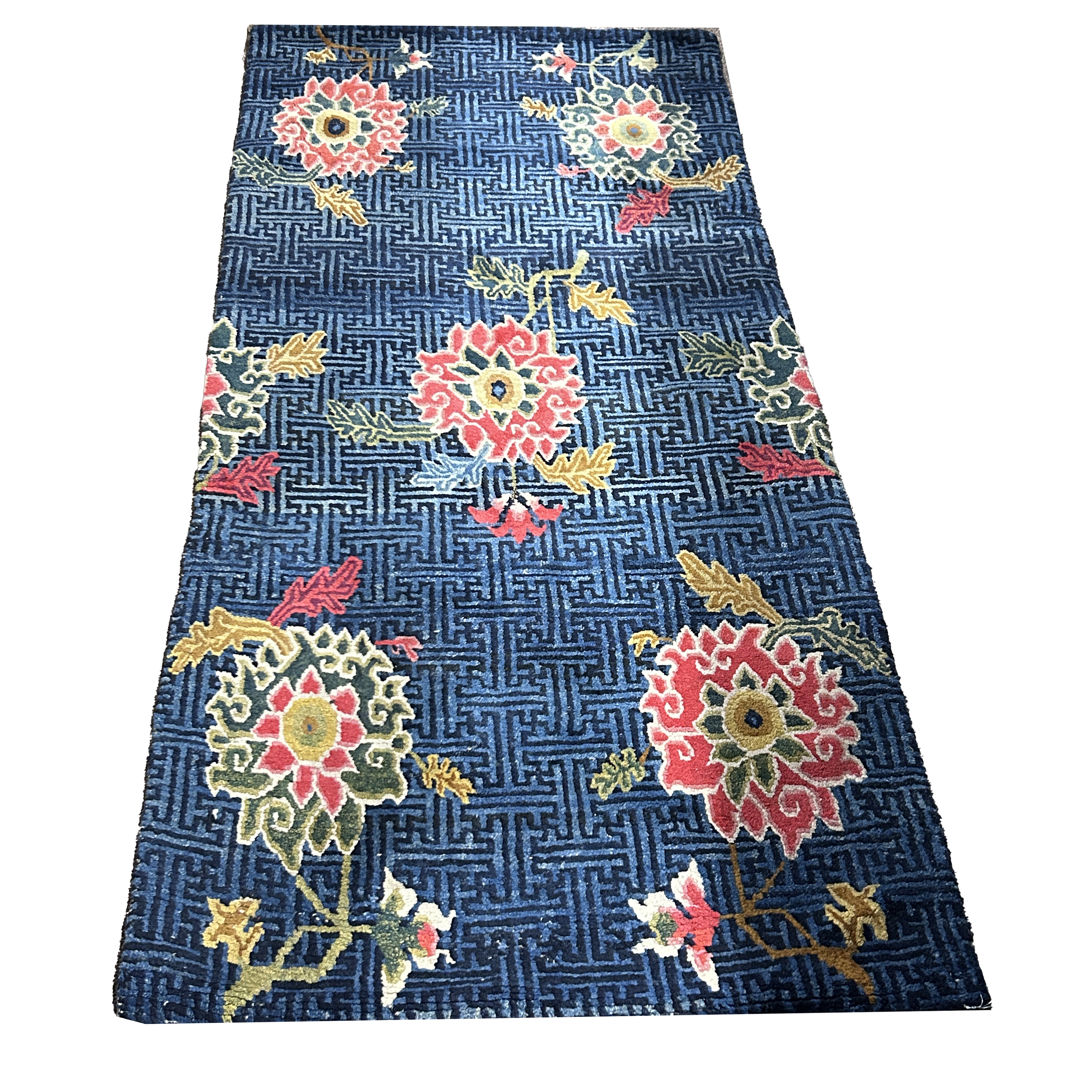 AN ANTIQUE TIBETAN CARPET An