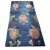 AN ANTIQUE TIBETAN CARPET An a