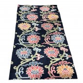 AN ANTIQUE TIBETAN CARPET An a