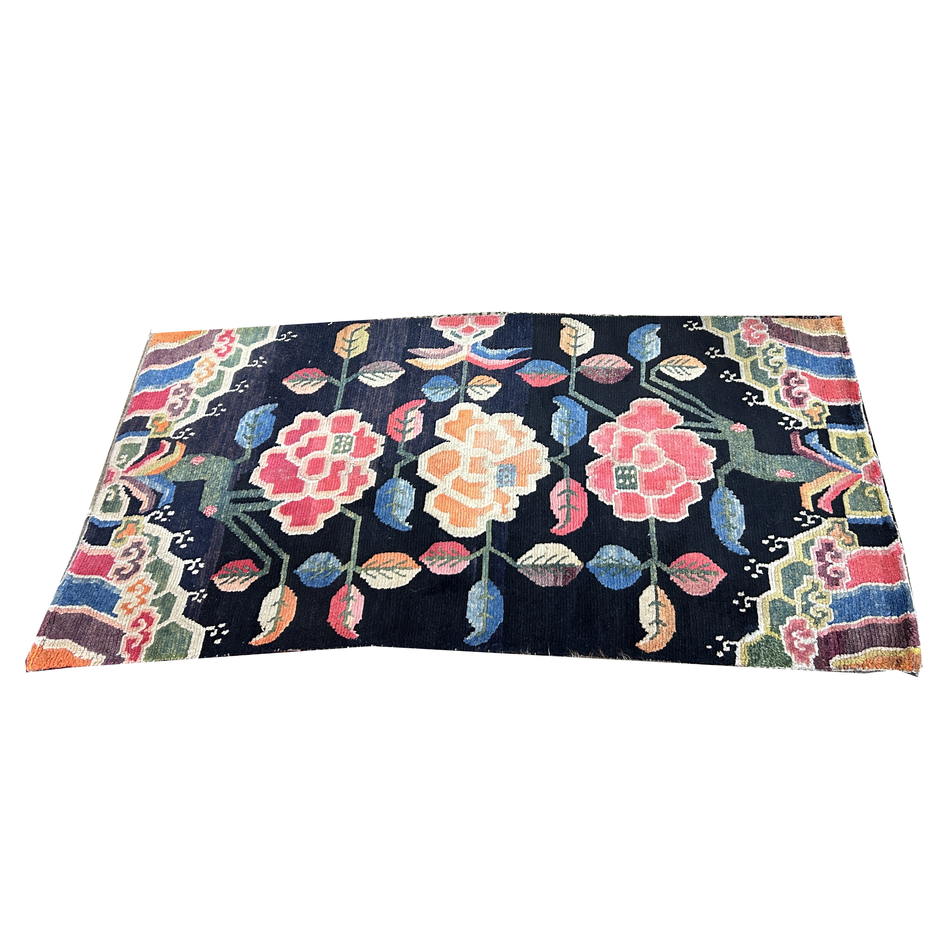 AN ANTIQUE TIBETAN CARPET An