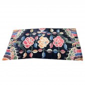 AN ANTIQUE TIBETAN CARPET An a
