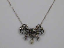 An antique white metal (tests