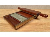 An antique wood and brass Phar
