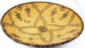 AN APACHE FIGURAL DECORATED BA