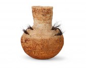 AN APACHE WATER BASKETAn Apach