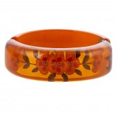 AN APPLE JUICE BAKELITE REVERS