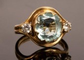 An aquamarine and diamond ring