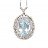 AN AQUAMARINE, DIAMOND AND 14K