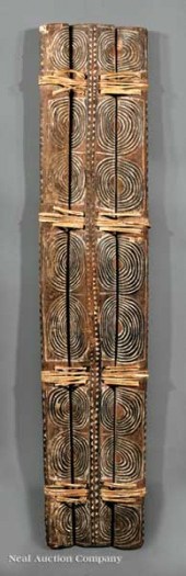 An Arawae Carved and Painted W