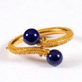An Archaeological revival gold
