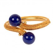 An Archaeological revival gold