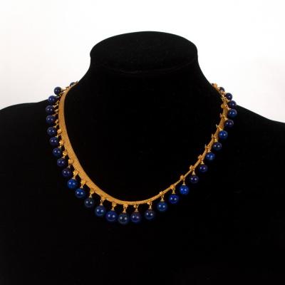 An Archaeological revival gold