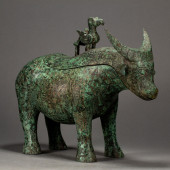 AN ARCHAIC BRONZE RITUAL WINE