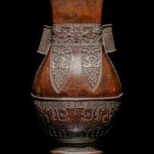 An Archaistic Bronze Vase, Fan