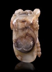 *An Archaistic Carved Jade Cic