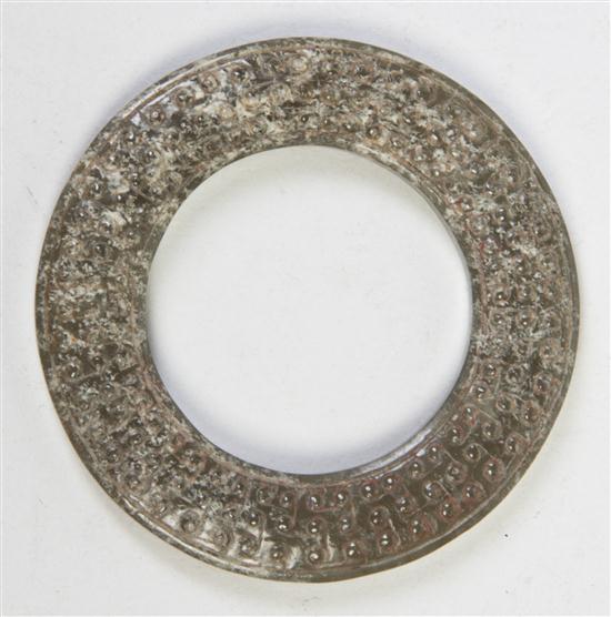 An Archaistic Jade Ring having