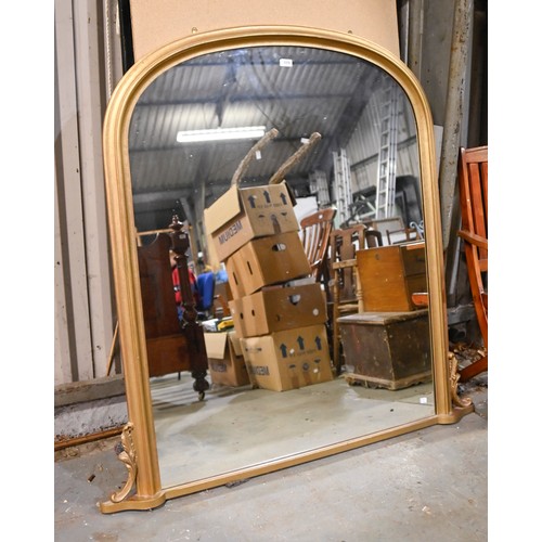 An arched gold painted wood