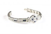 AN ART DECO 14K FILIGREE WHITE