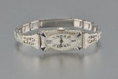 An Art Deco 18k White Gold Wat