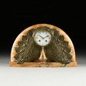AN ART DECO BRONZE PEACOCK AND