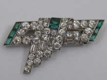 An Art Deco diamond and emerald