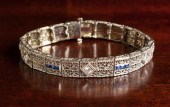 AN ART DECO DIAMOND, BLUE SAPP