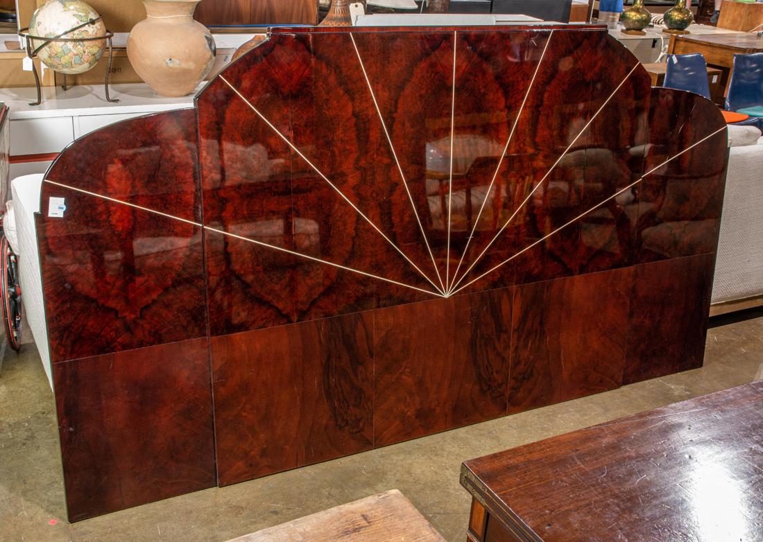AN ART DECO EBONIZED LACQUERED WOOD