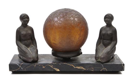 An Art Deco Figural Lamp having a