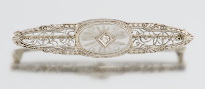 An Art Deco Gold and Camphor