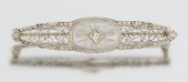 An Art Deco Gold and Camphor G