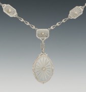 An Art Deco Gold and Camphor G