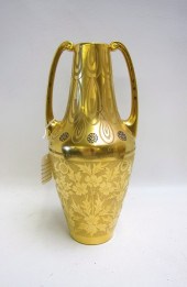 AN ART DECO GOLD DOUBLE-HANDLE