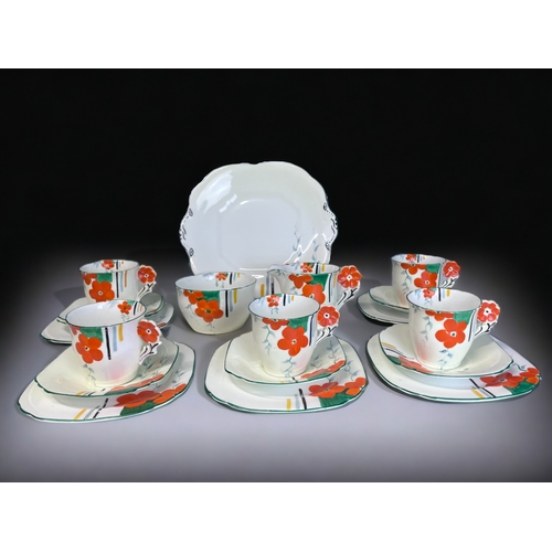 AN ART DECO HAND PAINTED PART