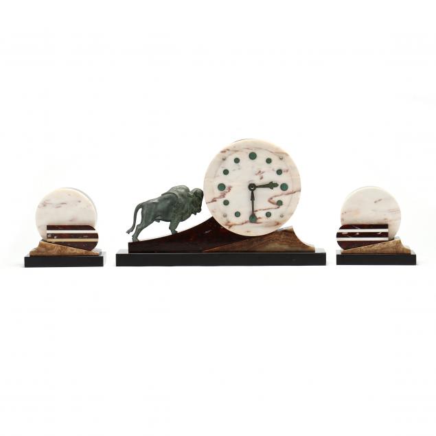 AN ART DECO HARDSTONE AND METAL