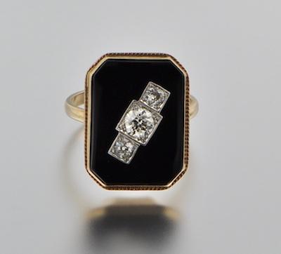 An Art Deco Onyx and Diamond Ring
