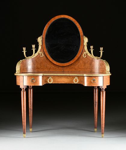 AN ART DECO ORMOLU MOUNTED BURL