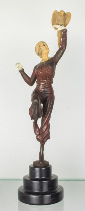 AN ART DECO PATINATED METAL MO