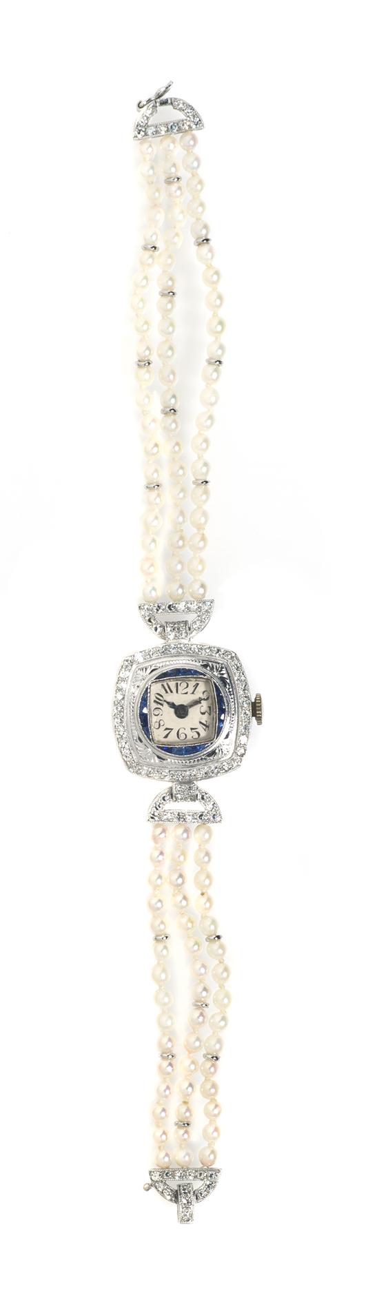 An Art Deco Platinum Diamond