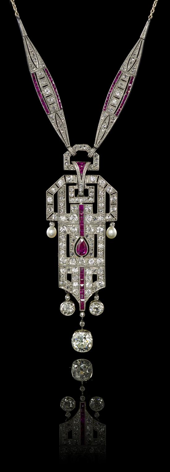 An Art Deco Platinum Pearl Ruby and