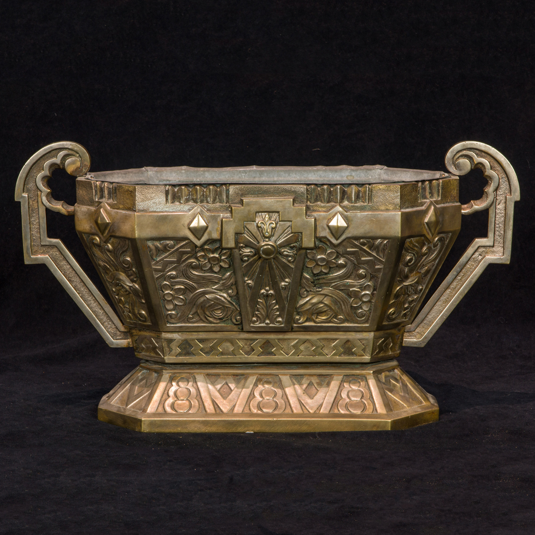 AN ART DECO SILVERED BRONZE