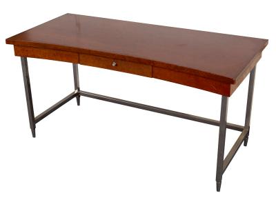 An Art Deco style desk, veneered in
